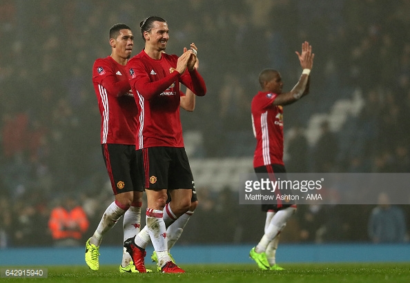 Zlatan Ibrahimović applauds alongside his Manchester United teammates.