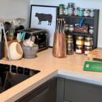 Kitchen worktop with a knife block and adapted food-preparation board